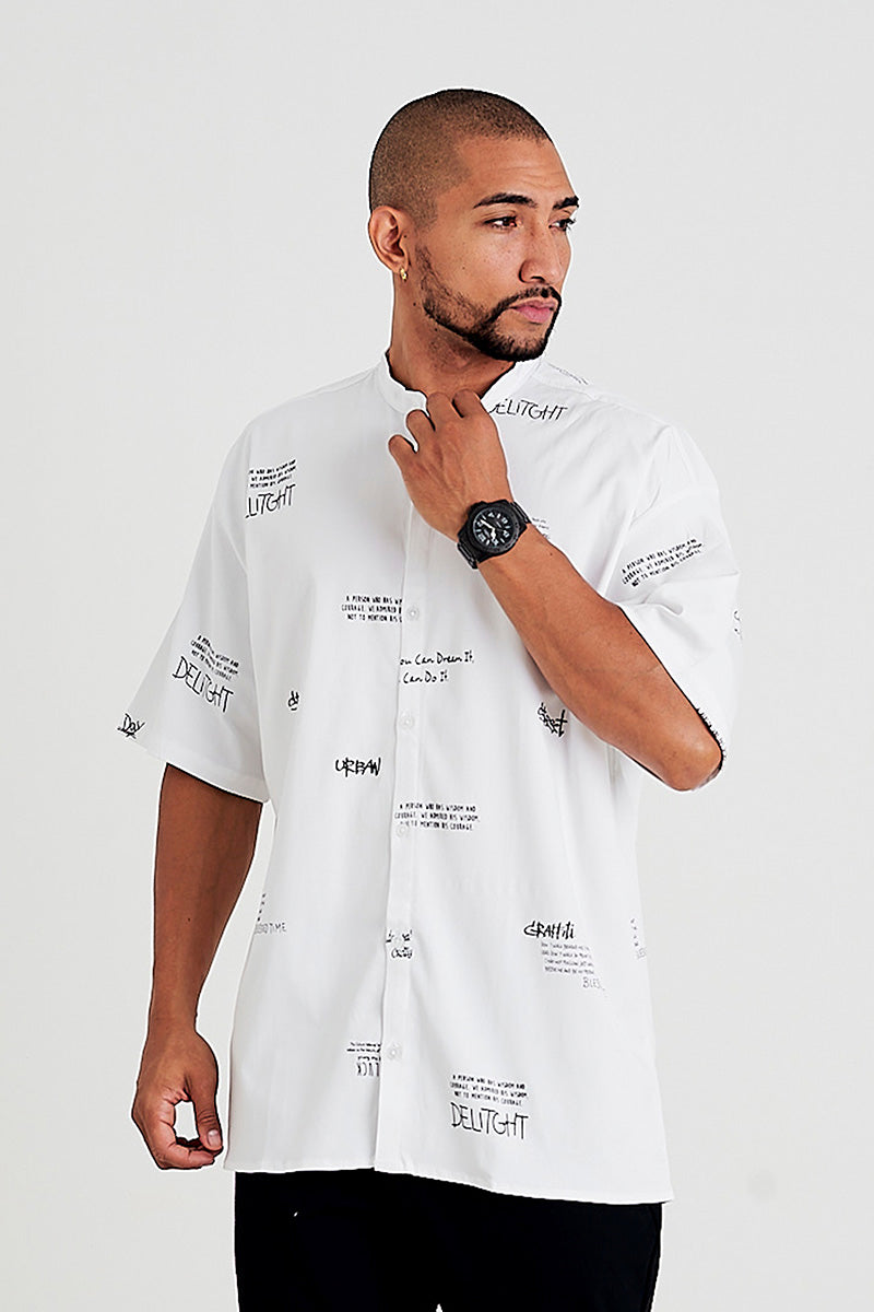 Camisa oversize estampada letras blanca